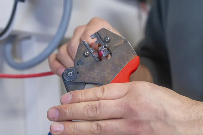 Framed Print : Industrial Print: Hand Processing Cable with Pliers