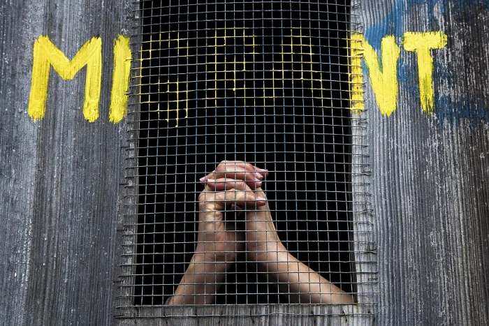 Framed Print : Hands Behind Bars: Migrant Support Print Framed Print : Hands Behind Bars: Migrant Support Print