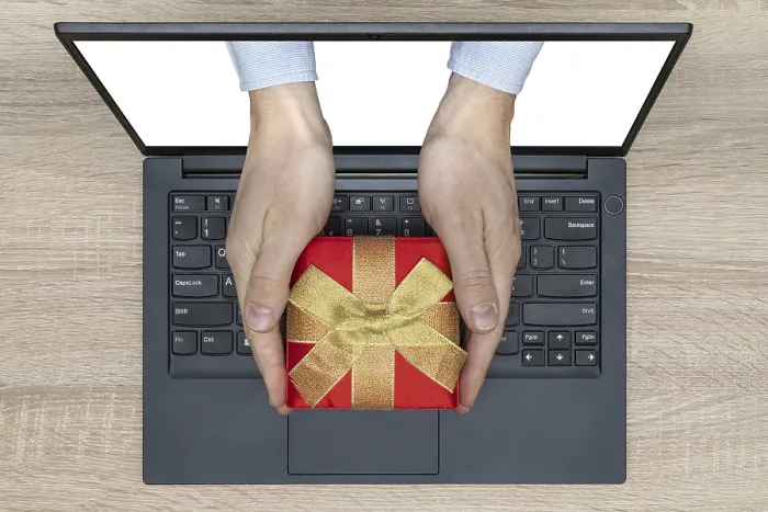 Framed Print : Hands with Gift Emerging from Laptop Screen Print Framed Print : Hands with Gift Emerging from Laptop Screen Print