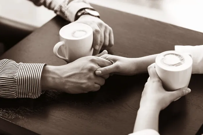 Framed Print : Hands on the Table Holding Coffee Cups Print Framed Print : Hands on the Table Holding Coffee Cups Print