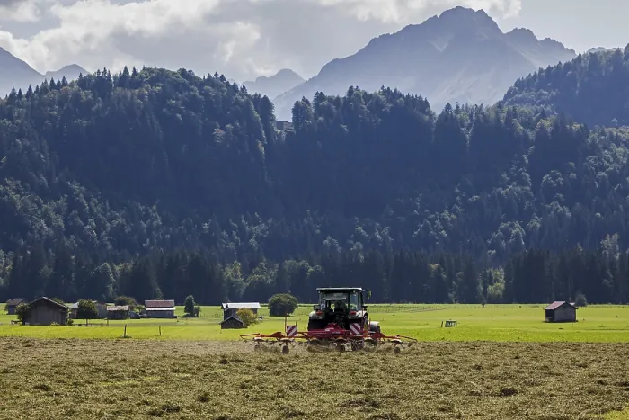 Framed Print : Haymaking with Tractor Print, Oberstdorf, Germany Framed Print : Haymaking with Tractor Print, Oberstdorf, Germany