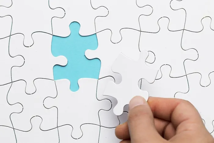 Framed Print : Human Hand Inserting Puzzle Piece Print Framed Print : Human Hand Inserting Puzzle Piece Print