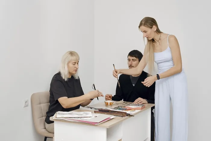Framed Print : Three Individuals Engage in Creative Workshop Print Framed Print : Three Individuals Engage in Creative Workshop Print