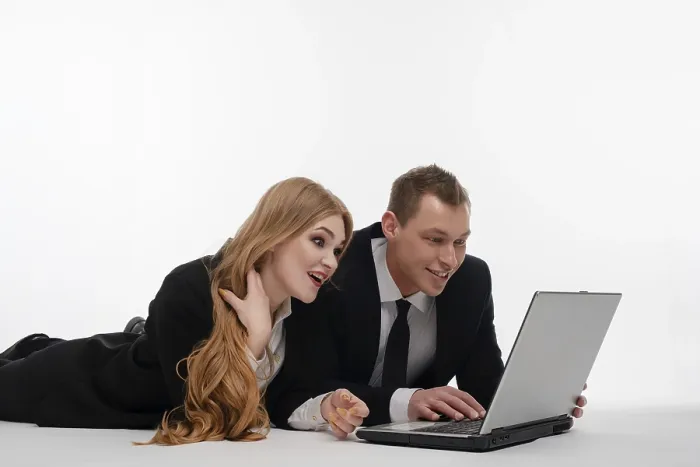 Framed Print : Collaborative Work Print: Two Individuals on a Laptop Framed Print : Collaborative Work Print: Two Individuals on a Laptop