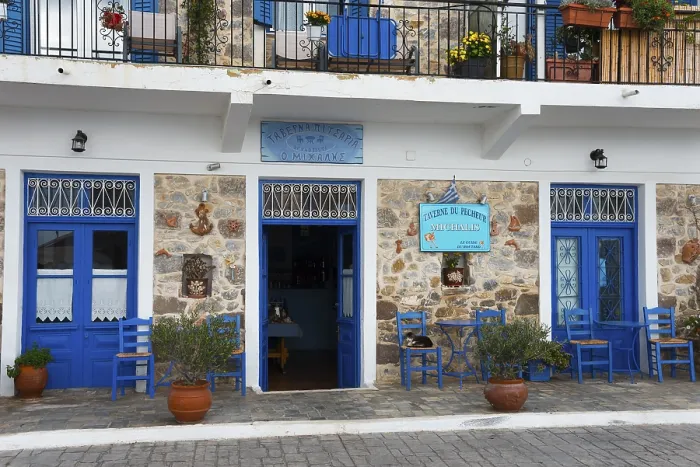 Framed Print : Inviting Cafe Print with Blue Elements and Stone Wall