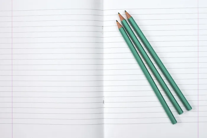 Framed Print : Back to School Print: Lined Exercise Book and Three Pencils Framed Print : Back to School Print: Lined Exercise Book and Three Pencils