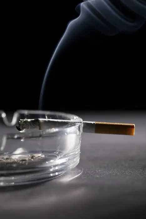 Framed Print : Lit Cigarette in Ashtray Print Framed Print : Lit Cigarette in Ashtray Print