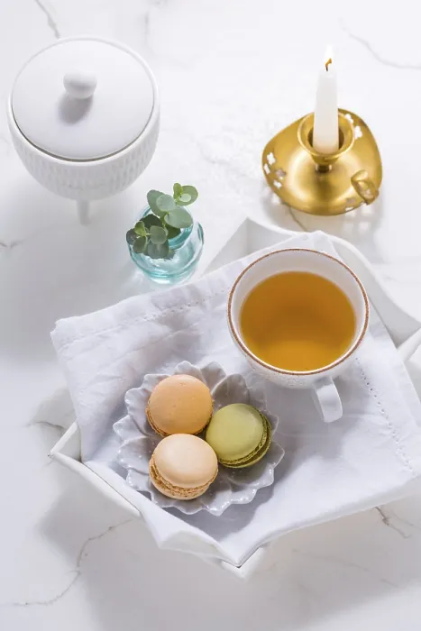 Framed Print : Macarons and Tea Print on White Table Framed Print : Macarons and Tea Print on White Table