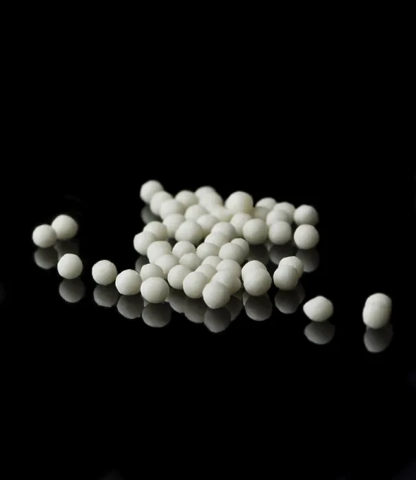 Framed Print : Macro Print of Homeopathic Medication on Black Surface Framed Print : Macro Print of Homeopathic Medication on Black Surface