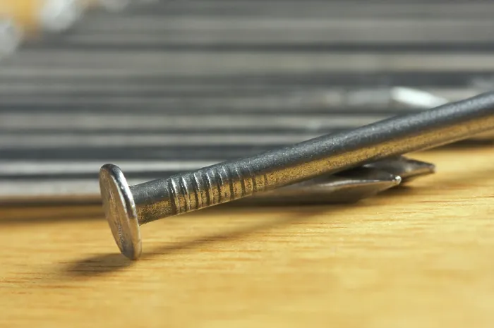 Framed Print : Macro Print of Nails on Wood Background Framed Print : Macro Print of Nails on Wood Background