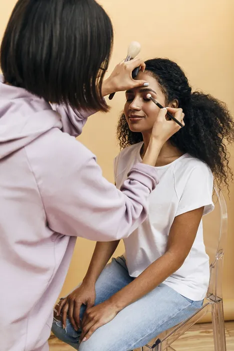 Framed Print : Makeup Artist Applying Eye Makeup Print Framed Print : Makeup Artist Applying Eye Makeup Print