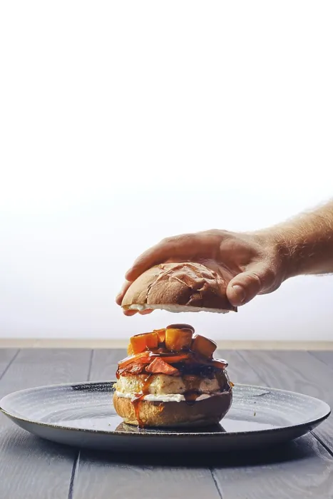 Framed Print : Male Hand Assembling Beef and Bacon Burger Print Framed Print : Male Hand Assembling Beef and Bacon Burger Print