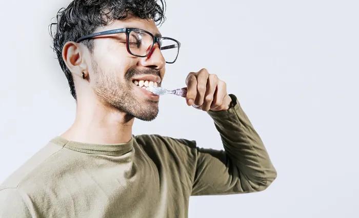 Framed Print : Man Brushing Teeth Print - Tooth Care Concept Framed Print : Man Brushing Teeth Print - Tooth Care Concept