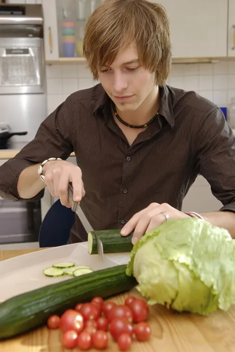 Framed Print : Man Cuts Cucumbers Print Framed Print : Man Cuts Cucumbers Print