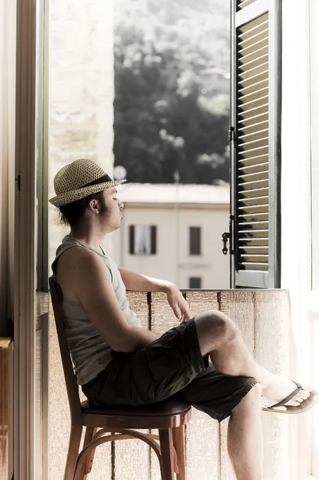 Framed Print : Man with Hat Sitting Next to Window Print Framed Print : Man with Hat Sitting Next to Window Print