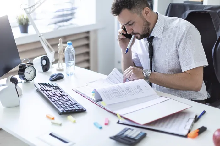 Framed Print : Office Worker on Phone, Holding Marker Framed Print : Office Worker on Phone, Holding Marker