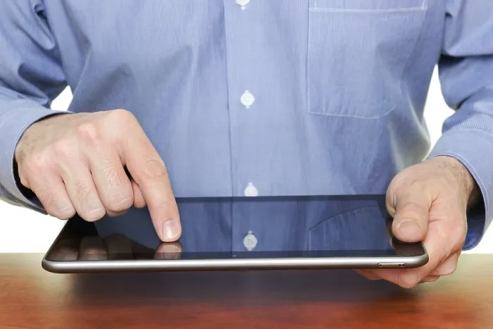 Framed Print : Man Using a Tablet Computer Print Framed Print : Man Using a Tablet Computer Print