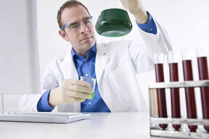 Framed Print : Man Working on an Experiment Laboratory Print