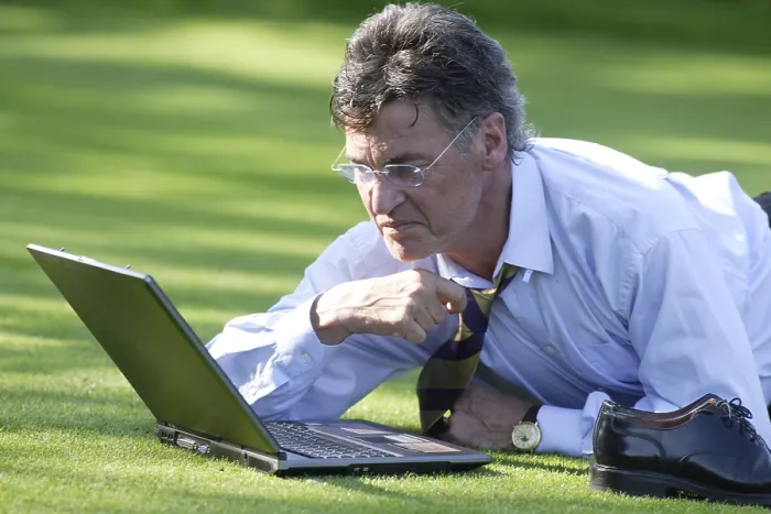 Framed Print : Manager Working on Notebook in Park Print Framed Print : Manager Working on Notebook in Park Print