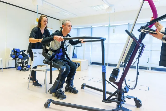 Framed Print : Print of Mechanical Exoskeleton in Rehabilitation Setting Framed Print : Print of Mechanical Exoskeleton in Rehabilitation Setting
