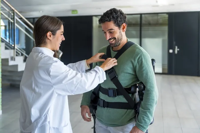 Framed Print : Print: Modern Physiotherapy with Mechanical Exoskeleton Framed Print : Print: Modern Physiotherapy with Mechanical Exoskeleton