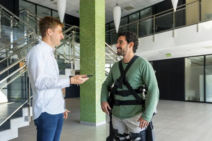Framed Print : Mechanical Exoskeleton Print - Physiotherapy Consultation Framed Print : Mechanical Exoskeleton Print - Physiotherapy Consultation