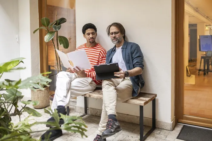 Framed Print : Two Men Collaborate in a Bright Coworking Space Print Framed Print : Two Men Collaborate in a Bright Coworking Space Print