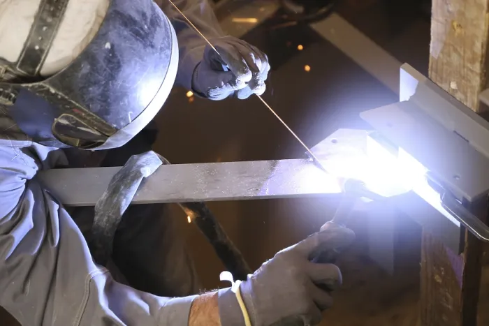 Framed Print : Metal Worker During Welding Work Print