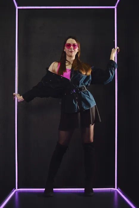 Framed Print : Neon-Lit Model in Oversized Shirt Print Framed Print : Neon-Lit Model in Oversized Shirt Print