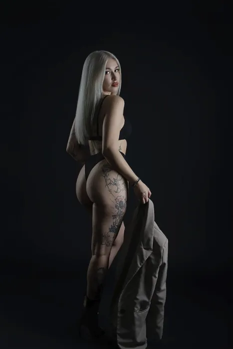 Framed Print : Confident Model Print Against Dark Background Framed Print : Confident Model Print Against Dark Background