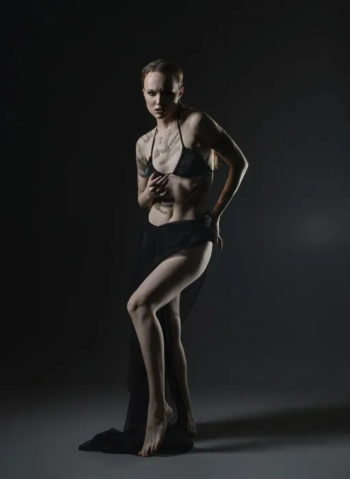 Framed Print : Confident Model in Dark Studio Print Framed Print : Confident Model in Dark Studio Print