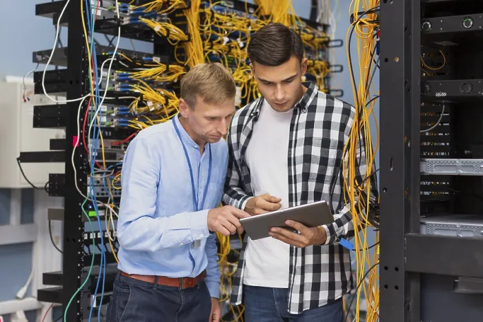 Framed Print : Network Engineers with Tablet Print (Medium Shot) Framed Print : Network Engineers with Tablet Print (Medium Shot)