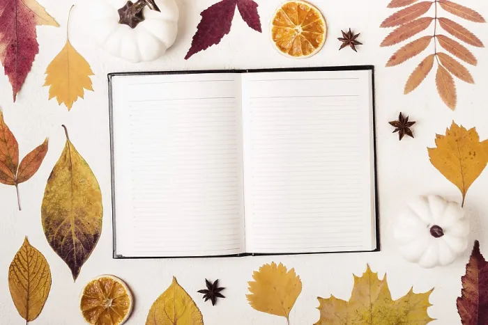 Framed Print : Notepad Print on Autumn Leaves Patterned Table Framed Print : Notepad Print on Autumn Leaves Patterned Table