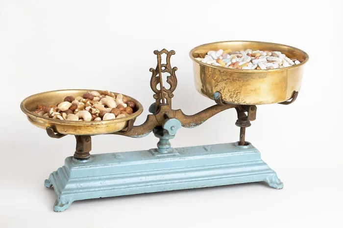 Framed Print : Antique Scale Weighs Nuts vs Medication Print Framed Print : Antique Scale Weighs Nuts vs Medication Print