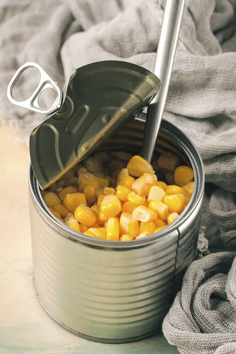 Framed Print : Open Tin Can with Corn Print, Top View Framed Print : Open Tin Can with Corn Print, Top View