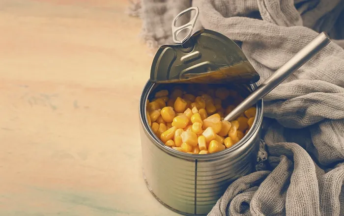 Framed Print : Open Tin Can with Corn Print, Top View Framed Print : Open Tin Can with Corn Print, Top View