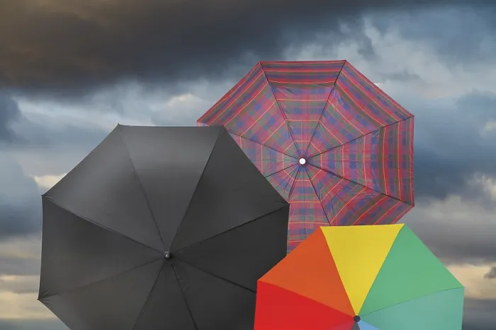 Framed Print : Open Umbrellas in Stormy Weather Print