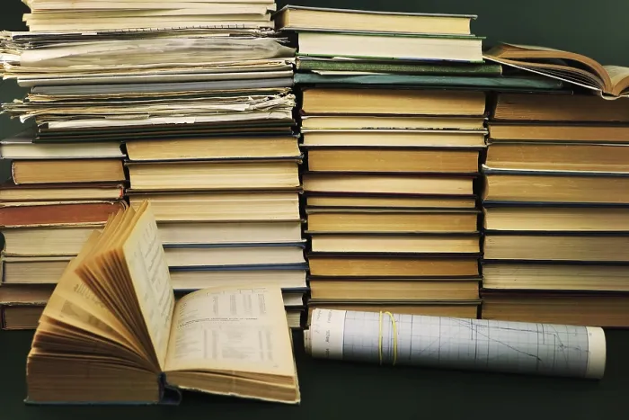 Framed Print : Scientific Reference Book Print Amidst a Stack of Literature