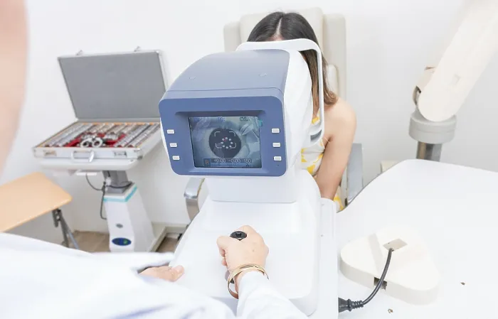 Framed Print : Optometrist Conducting Refractive Analysis Print Framed Print : Optometrist Conducting Refractive Analysis Print