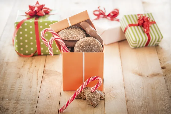 Framed Print : Orange Gift Box Print with Sweets and Gingerbread Framed Print : Orange Gift Box Print with Sweets and Gingerbread