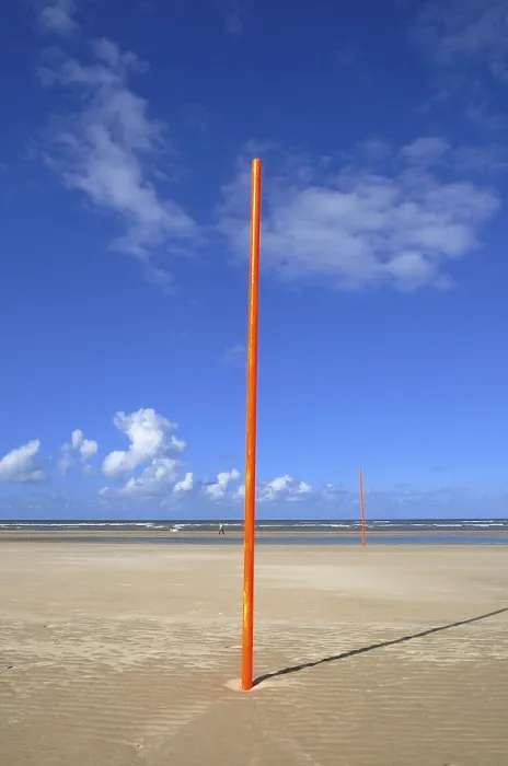 Framed Print : Orange-red Marker Posts on the Beach - Print Framed Print : Orange-red Marker Posts on the Beach - Print