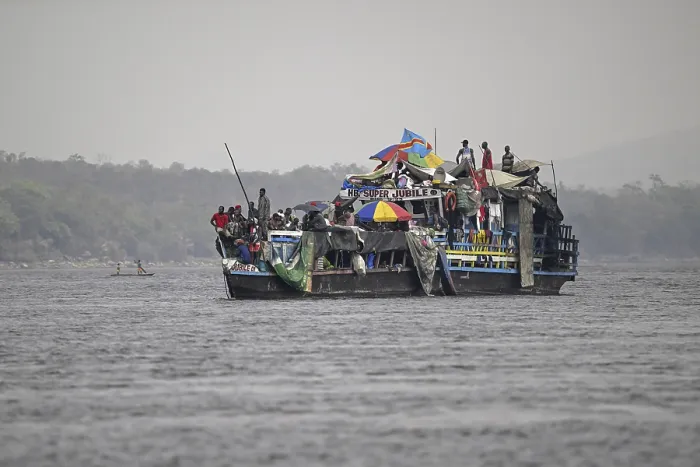 Framed Print : Overloaded Ferry Print on Congo River Framed Print : Overloaded Ferry Print on Congo River