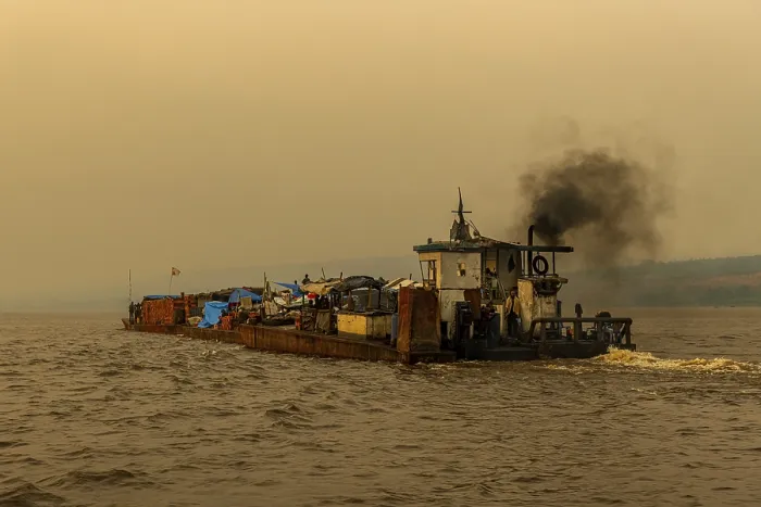 Framed Print : Overloaded Riverboat Print on Congo River at Sunset Framed Print : Overloaded Riverboat Print on Congo River at Sunset