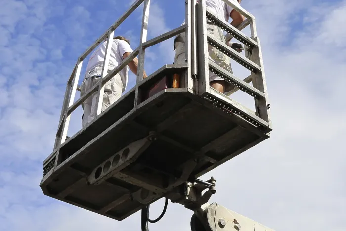 Framed Print : Painter on a working platform Print Framed Print : Painter on a working platform Print