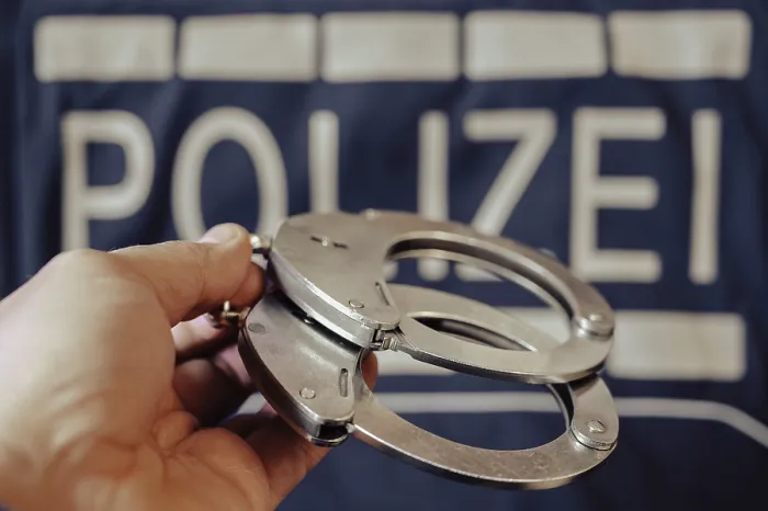 Framed Print : Police Handcuffs Print with Background Sign Framed Print : Police Handcuffs Print with Background Sign