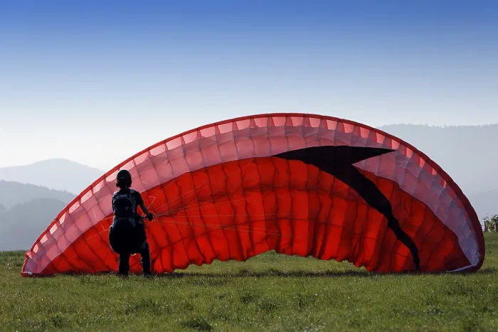 Framed Print : Paraglider Practicing on a Meadow Print, Germany Framed Print : Paraglider Practicing on a Meadow Print, Germany