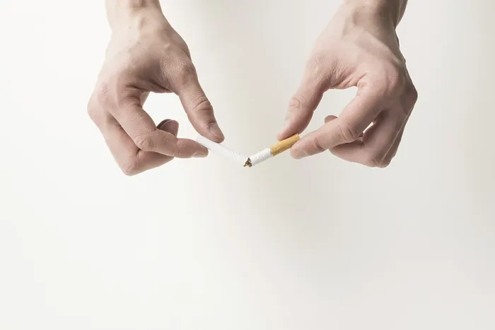 Framed Print : High-Quality Print of Hand Breaking Cigarette Framed Print : High-Quality Print of Hand Breaking Cigarette
