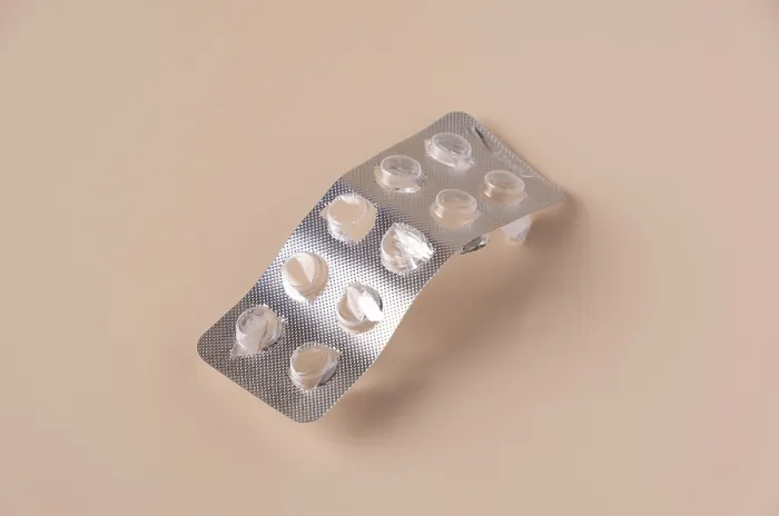 Framed Print : Empty Pill Packaging Print on Beige Background