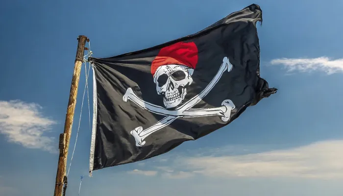Framed Print : The Pirate Flag Print - Isolated Against Blue Sky Framed Print : The Pirate Flag Print - Isolated Against Blue Sky