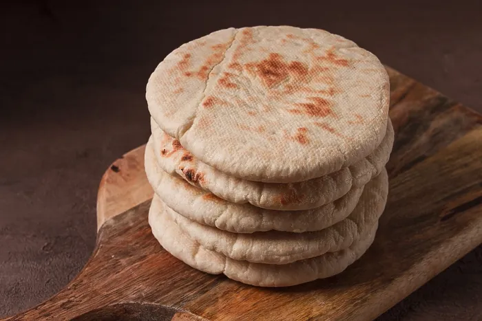 Framed Print : Pita Bread Stack Print on Table Framed Print : Pita Bread Stack Print on Table